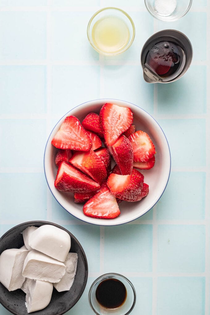 strawberries in a bowl with ice cubes