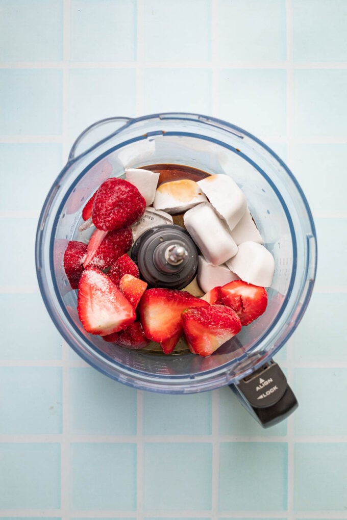 strawberries and coconut cream in food processor