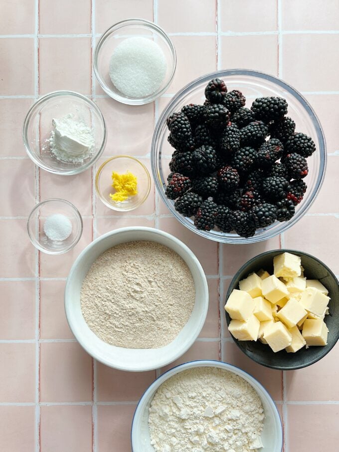 blackberries in bowl with flour and butter